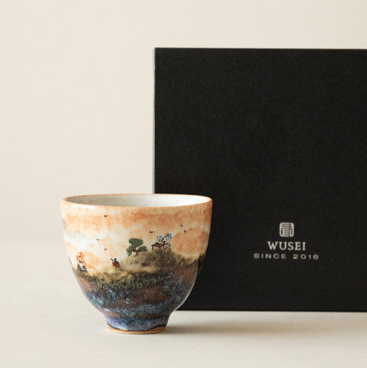 Tasse à thé avec motif de nuages ​​brûlés par le feu