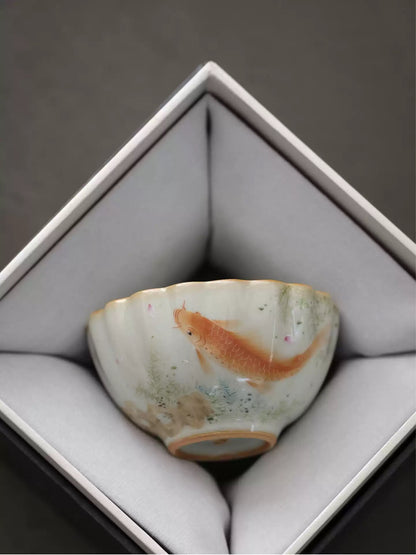 Sky-Blue Ru Ware Tea Cup, Hand-Painted Fish Motif