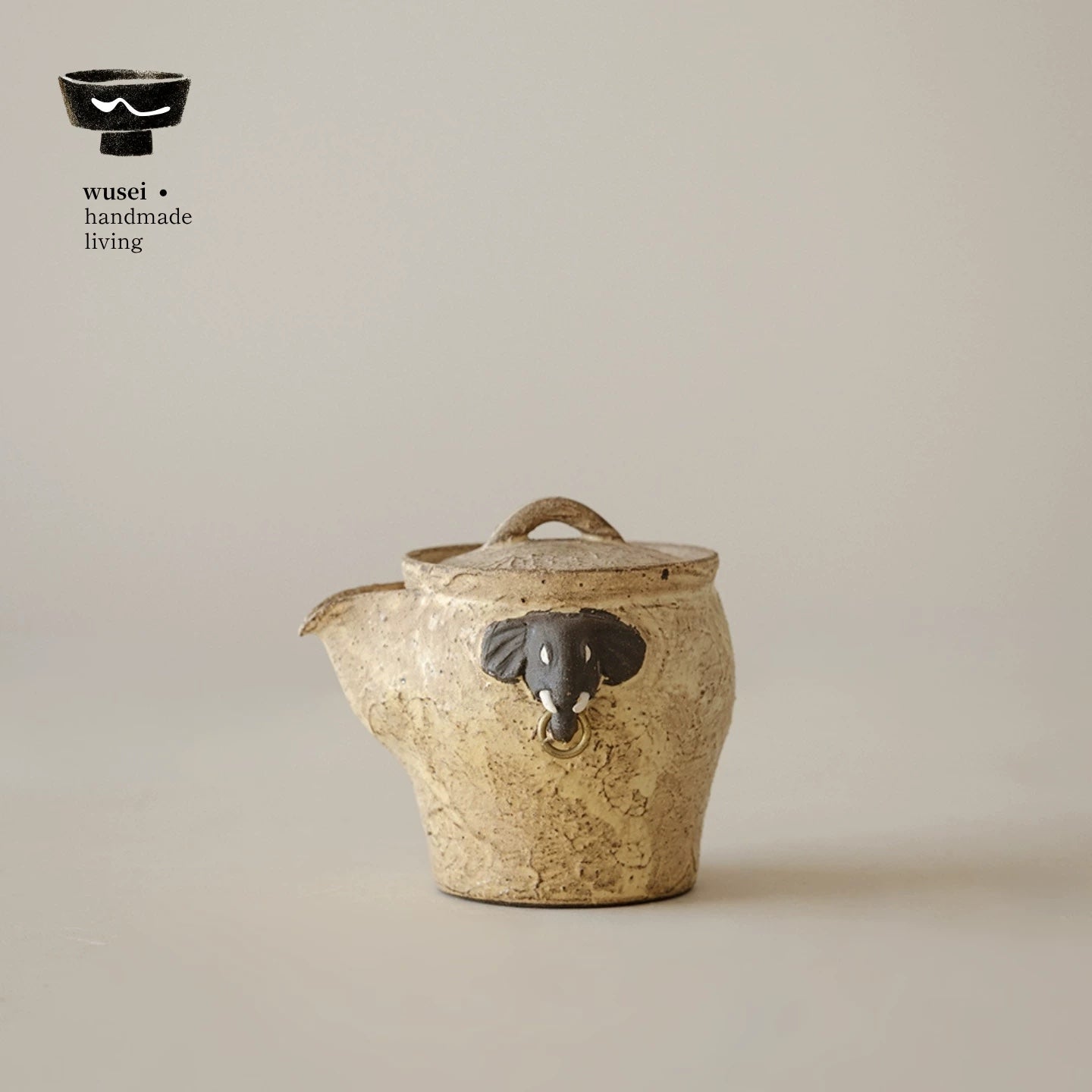Hand-Painted Rustic Clay Teapot with Elephant Handle