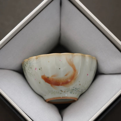 Sky-Blue Ru Ware Tea Cup, Hand-Painted Fish Motif